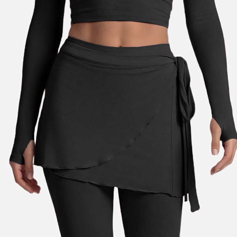 Ballet wrap skirt tied over full length leggings in the yoga set