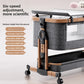 Gray baby crib with a wood grain frame and a panel listing six mattress height settings from 40 to 53 cm