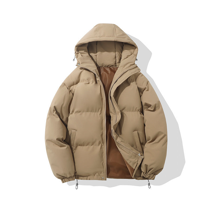 Hooded padded puffer jacket in khaki, worn over a hoodie
