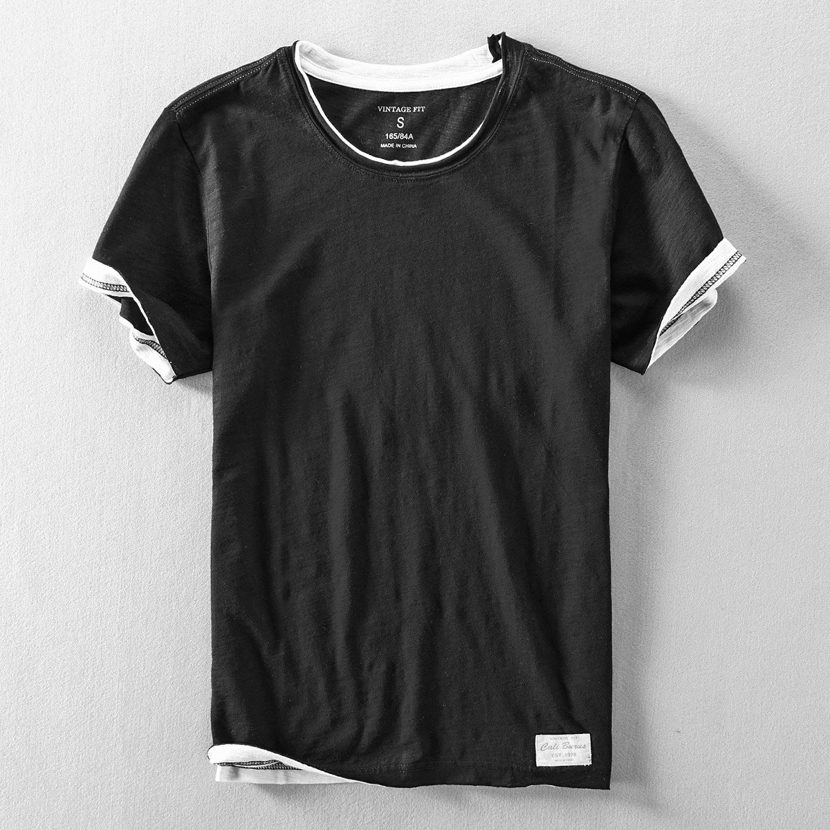 Black washed slub cotton short sleeve tee, front flat lay with faux two layer trim, size XXL
