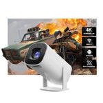 Projector with front grille and black pattern casing aimed at a wall showing an action scene, 4K and Wi-Fi 6 badges