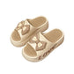 Womens platform slides, side view showing the thick platform sole