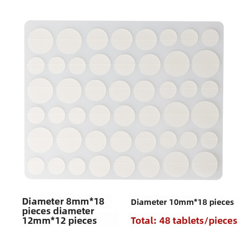 Sheet of forty eight hydrocolloid discs mixing eight, ten and twelve millimetre diameters