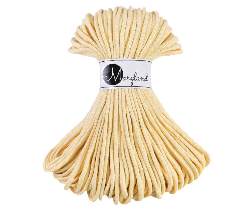 Matte pure cotton yarn strand shown for stitch definition in knitting