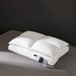 Feather soft microfibre fill inside the white bed pillow shown in detail