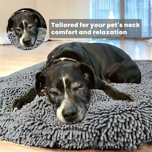 Deep looped chenille surface of a round pet bed with a soft raised edge