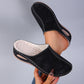 Black womens fleece lined slip on mule with closed round toe and low wedge sole, product photo