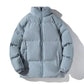 Men's quilted puffer jacket with a full zip and stand collar on a model