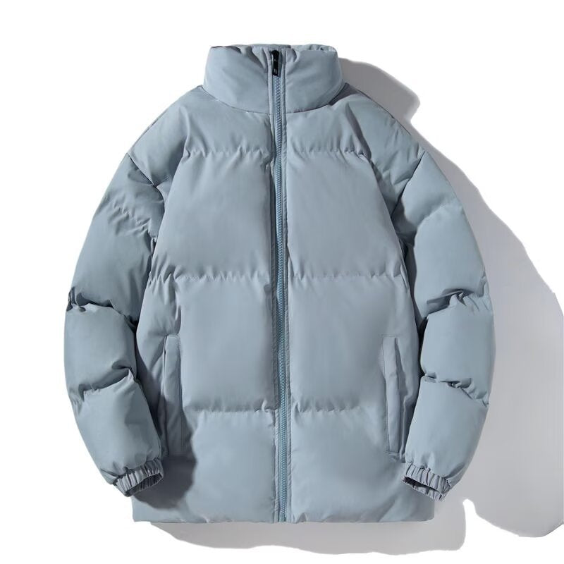 Men's quilted puffer jacket with a full zip and stand collar on a model