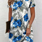 Close view of the digital floral print across the shoulder of a short sleeve dress