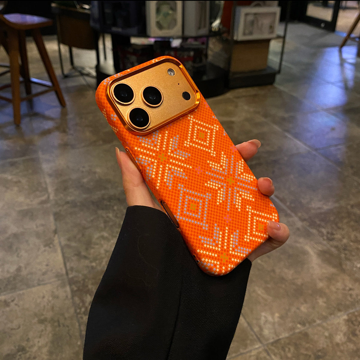 Orange diamond pattern magnetic iPhone case, hard shell camera detail