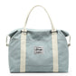 Light aqua nylon weekender travel bag, front view