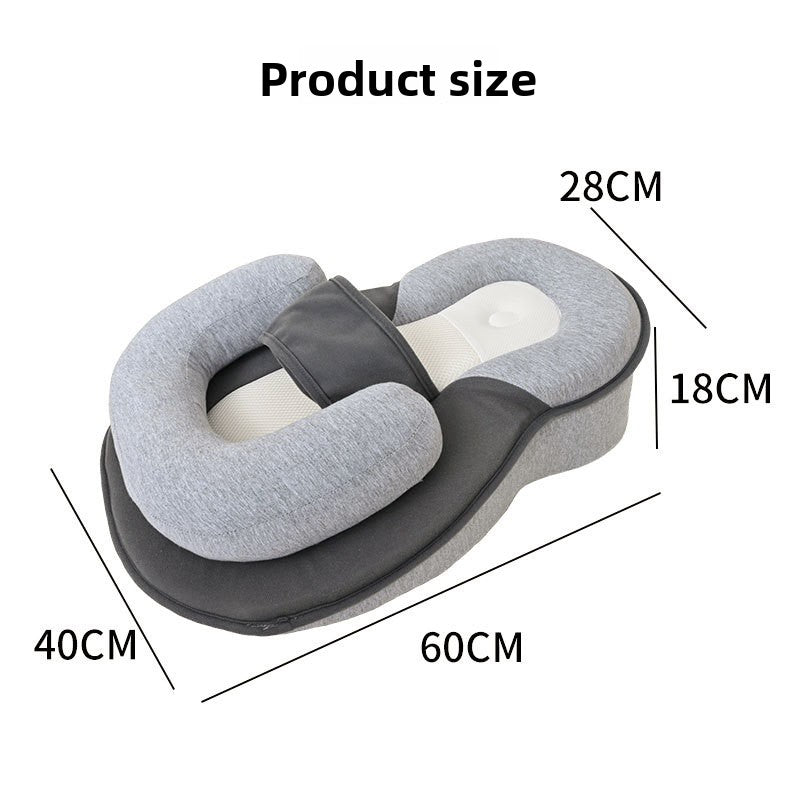Anti-reflux baby lounger in soft studio lighting showing the slope and bolsters