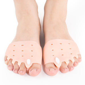 Pair of nude SEBS forefoot pads worn on both feet with five toe separator loops
