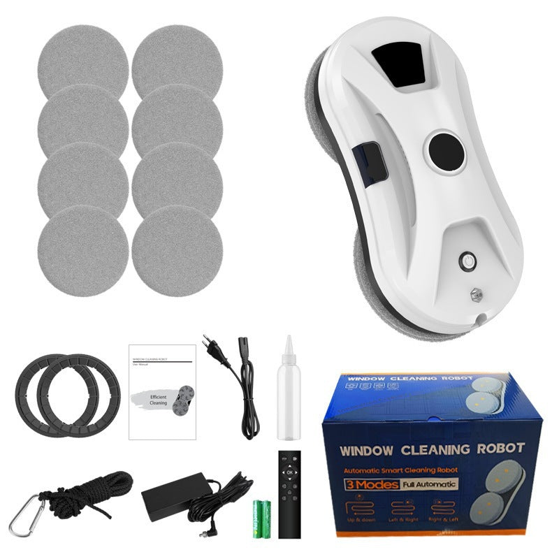 Automatic window cleaning robot with a black remote control handset in hand