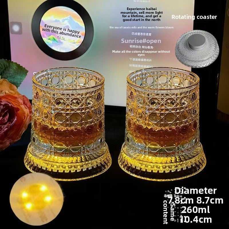 Maker panel showing the rotating coaster with its centre hub and the round LED light pad