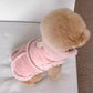 Small dog winter vest in brown faux suede with fleece collar shown flat with a leash