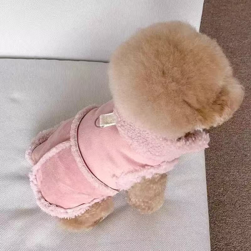 Small dog winter vest in brown faux suede with fleece collar shown flat with a leash