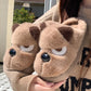 Brown dog plush slippers with half-closed eyes and a glossy black nose, size 40-41 option