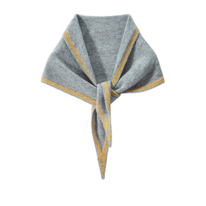 Light grey knit triangle scarf with yellow border stripes, knotted at the front with tapered tails