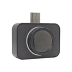 Black thermal camera module with a round infrared lens and a phone connector on a white background