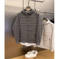 Side view of the hooded padded jacket showing the sleeve and body length