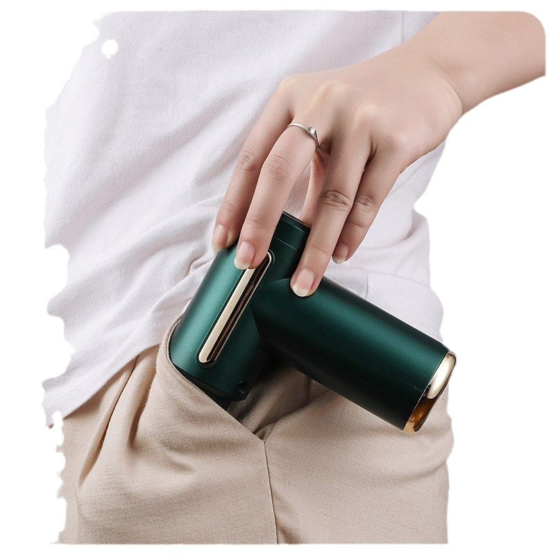 LED screen on a mini massage gun showing the speed level and battery