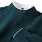 Dark teal textured knit top neckline close-up with ribbed stand-up collar and V-shaped insert
