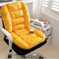 Plush yellow flannel seat and back cushion on a white office chair beside a desk