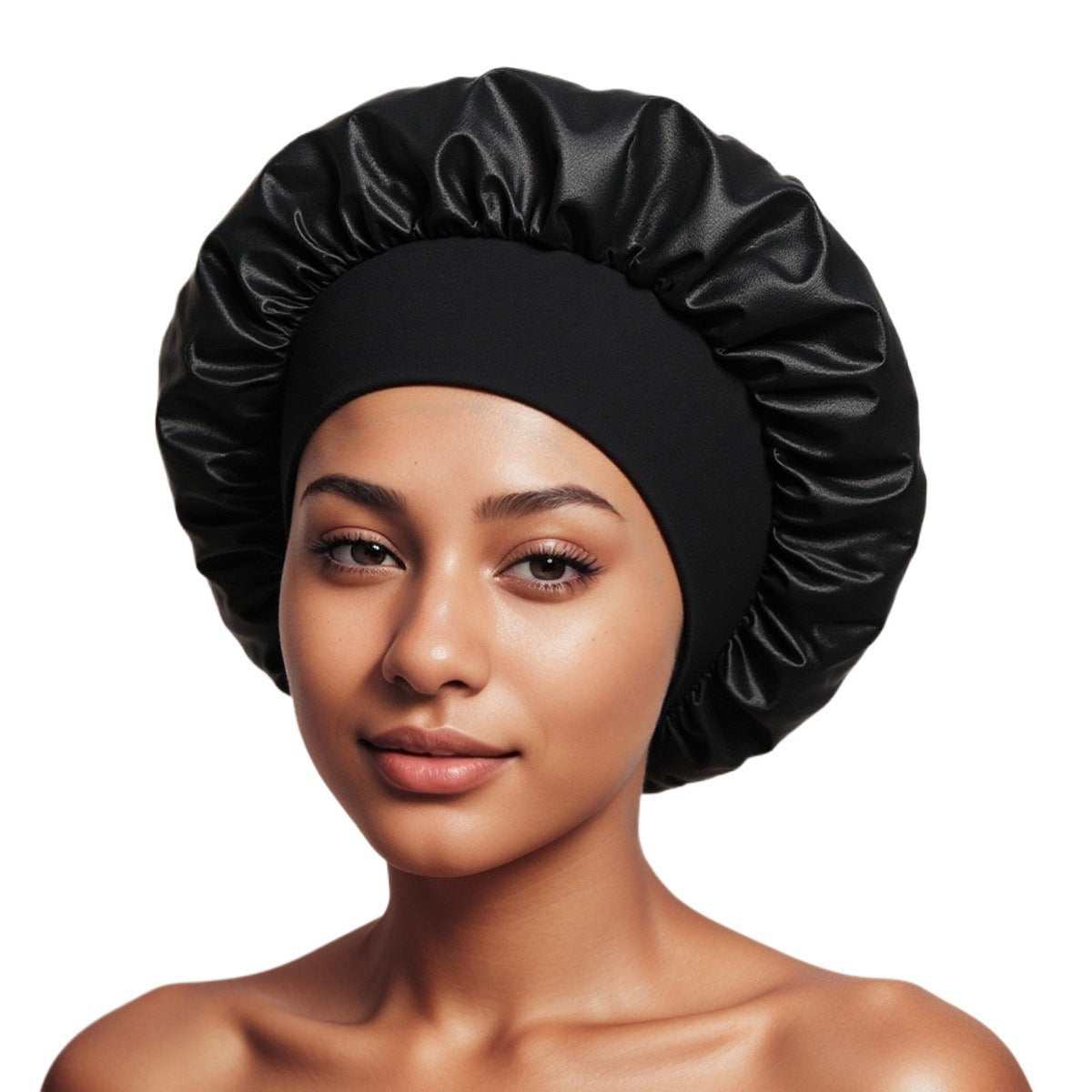 Woman wearing a black satin bonnet with a ruffled crown and a wide black elastic band