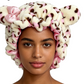 Model wearing the Leopard Print bear ear sleep cap with a pink satin bow, front view