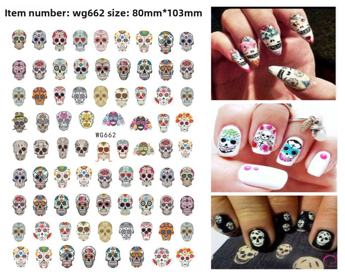 Halloween nail decals shown as a finished manicure with skulls and pumpkins