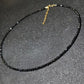 Black faceted glass bead necklace showing the sparkle of the cut glass beads