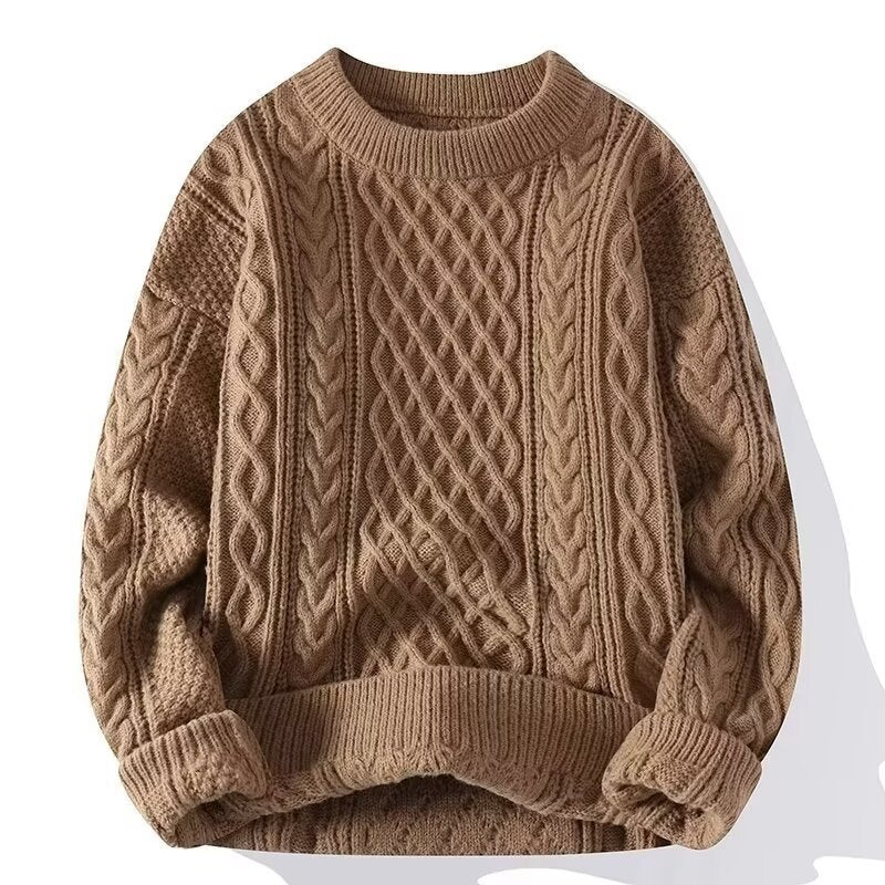 Cuff and hem detail of the cable knit pullover showing the ribbed knit trims