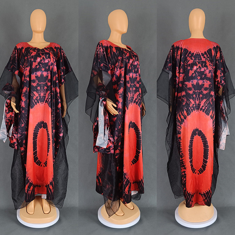 Red and black printed kaftan on three mannequins with black mesh sleeves, Fit 1 Black option