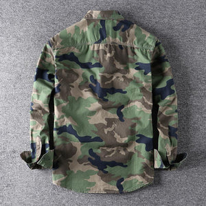 Men's washed camouflage long sleeve button shirt with two flap chest pockets front view of the green camo colourway