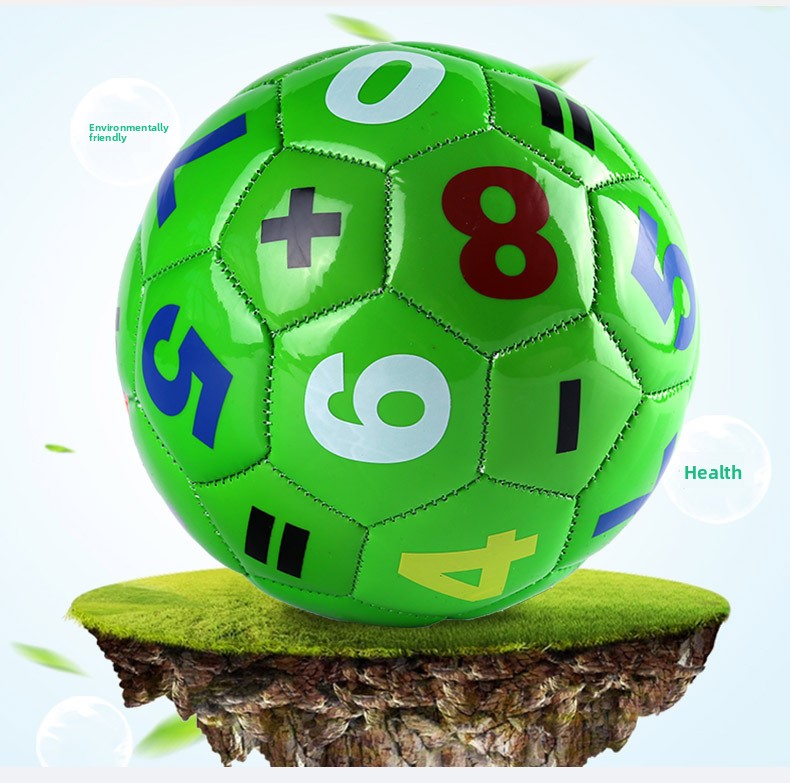 Green childrens number soccer ball resting on grass with bright printed digits and math symbols