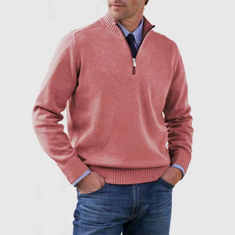 Pink mens acrylic knit quarter zip stand collar pullover sweater worn by a standing male model