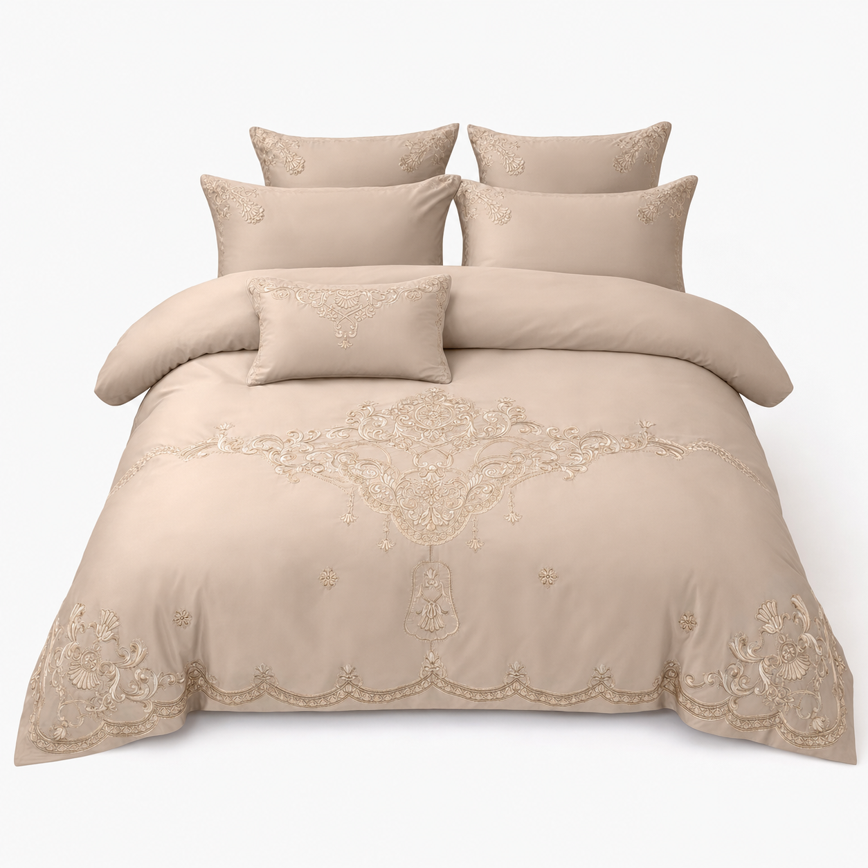Embroidered duvet cover smoothed across the marital bed