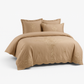 Fitted sheet corners stretched over deep mattress