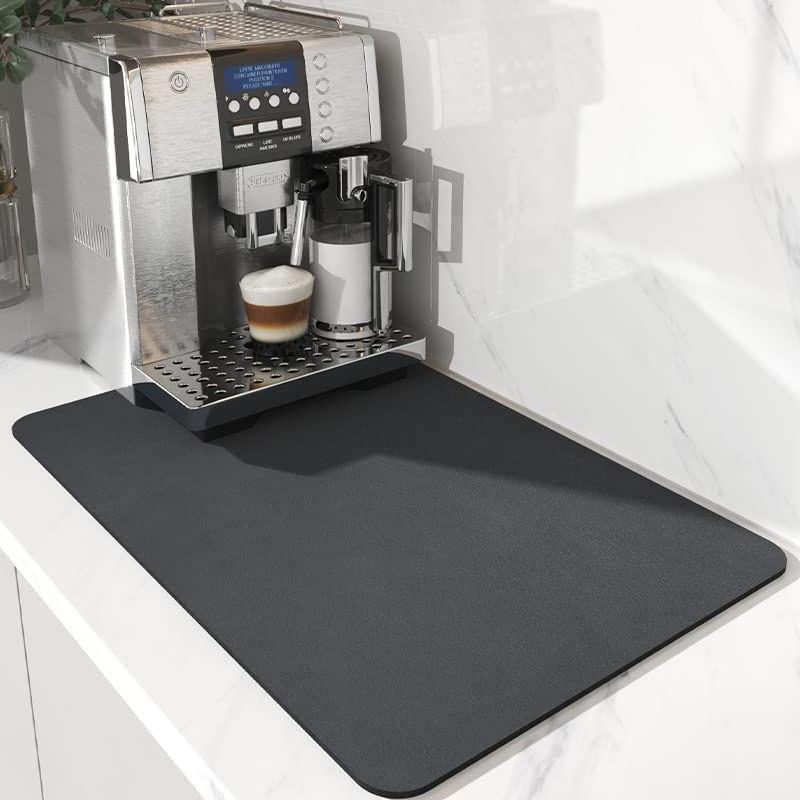 Square diatom mud absorbent mat resting flat on a kitchen counter