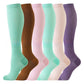 Pair of knee high compression running socks showing calf length and sole grip