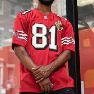 Side profile showing deep sleeveless armhole on the jersey