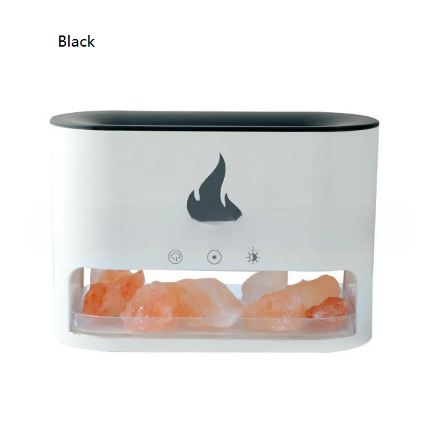 White aroma diffuser with black lid holding lit pink salt rocks in its front tray