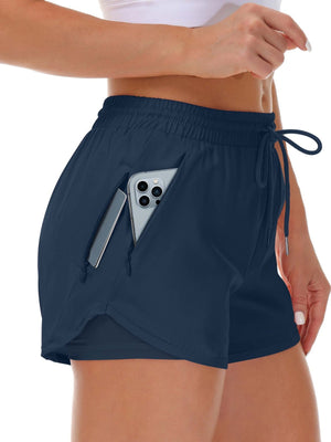 A navy blue womens two in one fitness shorts with a side phone pocket and inner liner, front view