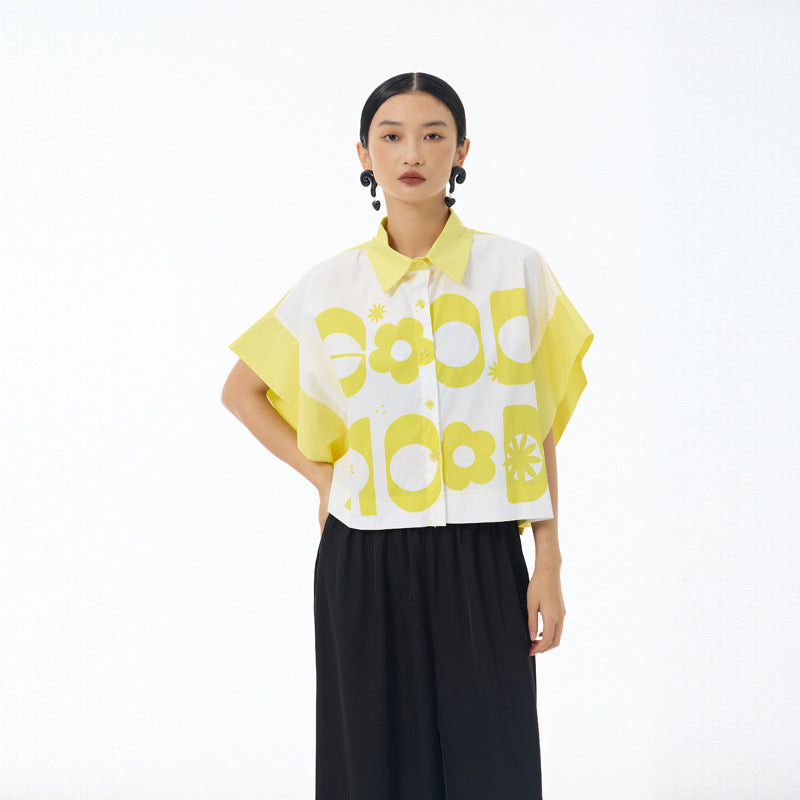 Yellow and white cropped shirt with bold Good Mood letter and daisy print front