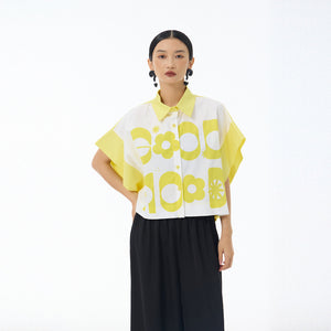 Yellow and white cropped shirt with bold Good Mood letter and daisy print front