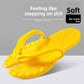 Pair of foldable EVA slippers folded in half at the arch to pack flat for travel