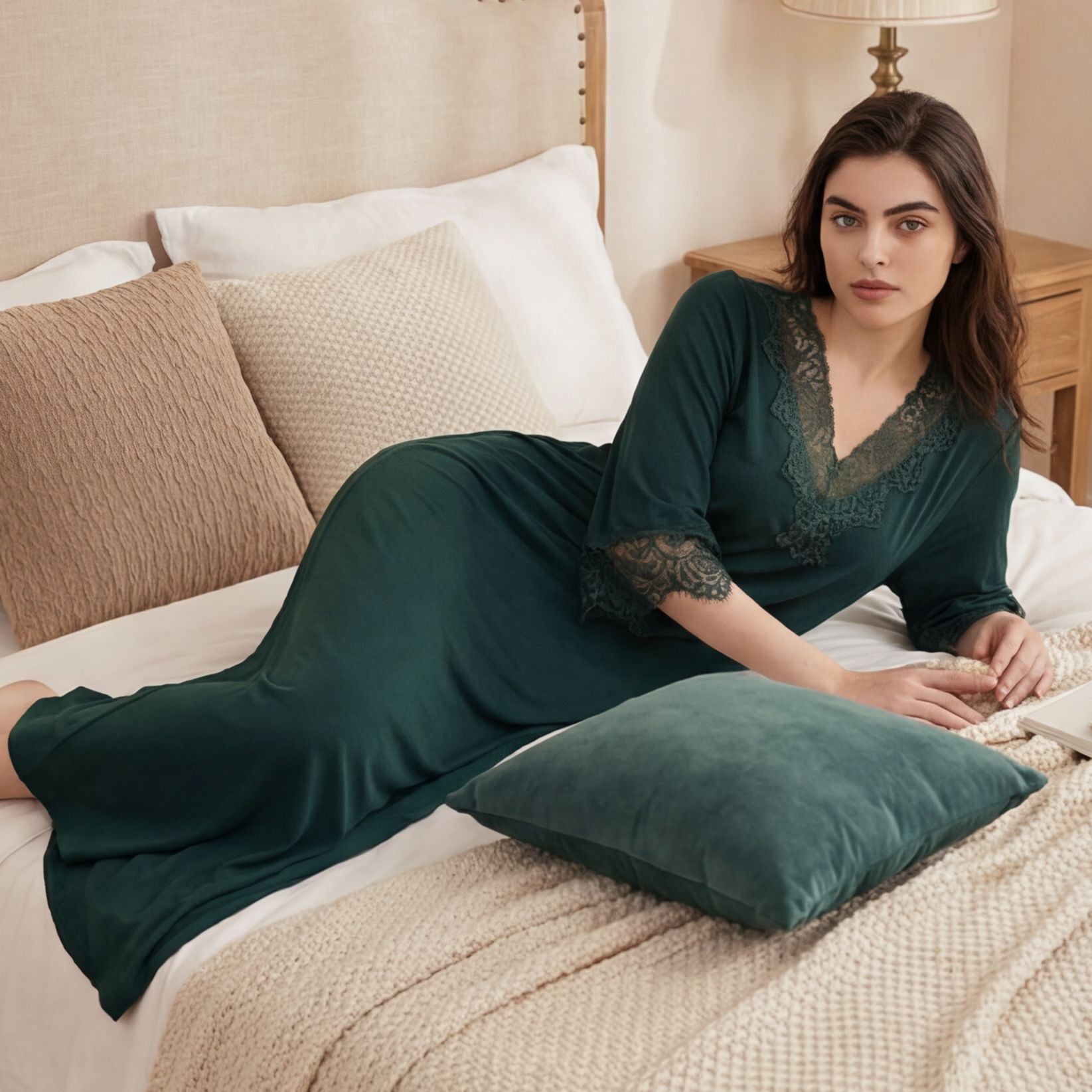 Lace trimmed nightgown shown at an angle with the lace neckline visible