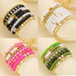 Four colorways of the beaded bracelet set, white green black and pink stacks side by side